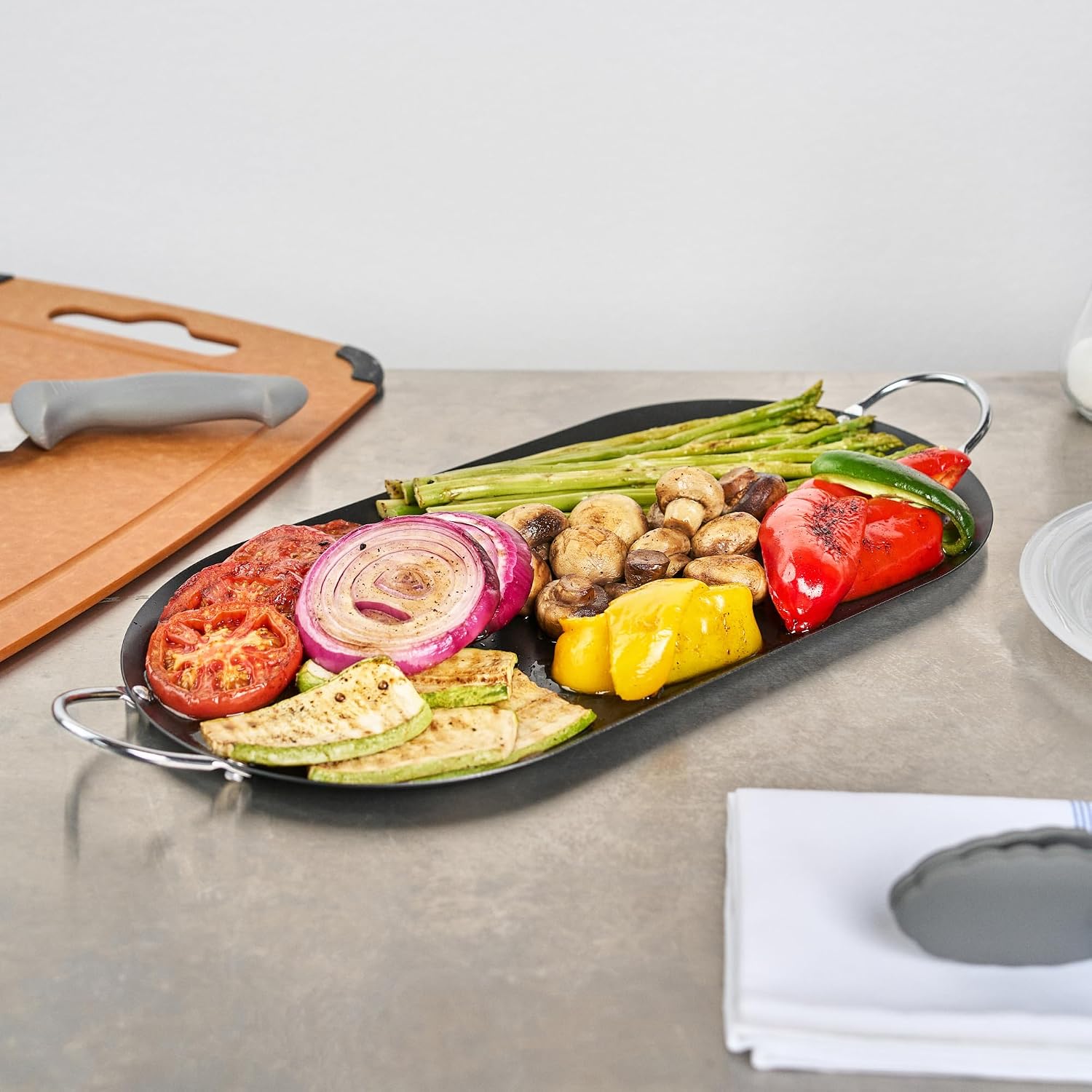 Restaurantware Comal 10 Pack of 8.8 Inch Carbon Steel Nonstick Oval Griddle with Metal Handles Premium Cookware Black