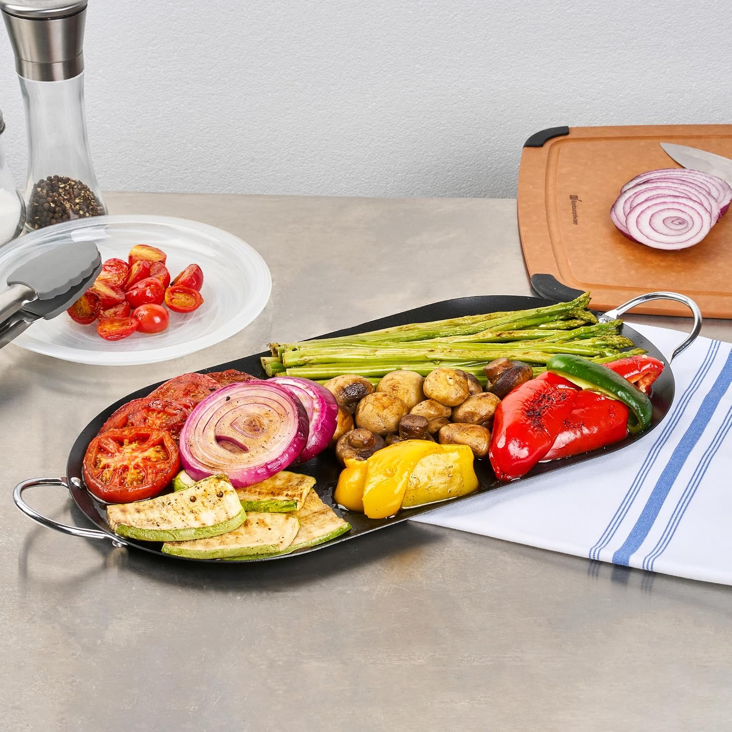 Restaurantware Comal 10 Pack of 8.8 Inch Carbon Steel Nonstick Oval Griddle with Metal Handles Premium Cookware Black