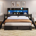 AMERLIFE King Size Bed Frame with 4 Storage Drawers, LED Bed Frame with 49.6' Tall Bookcase Headboard, Wood Platform Bed with Charging Station & 2 Slide Bedside Shelf, No Box Spring Needed/Black