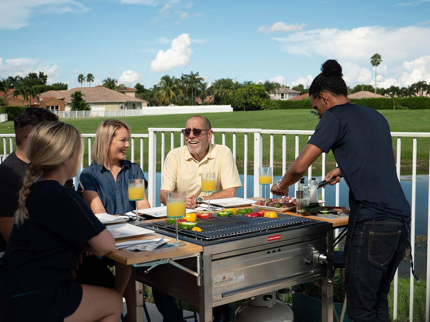 3-in-1 Sit Around Grill with Flat Top Teppanyaki Griddle, BBQ Rack and Cast Iron Grill - Propane Gas and Stainless Steel - Perfect for Outdoor Cooking and Portable for Tailgating, HBC1B