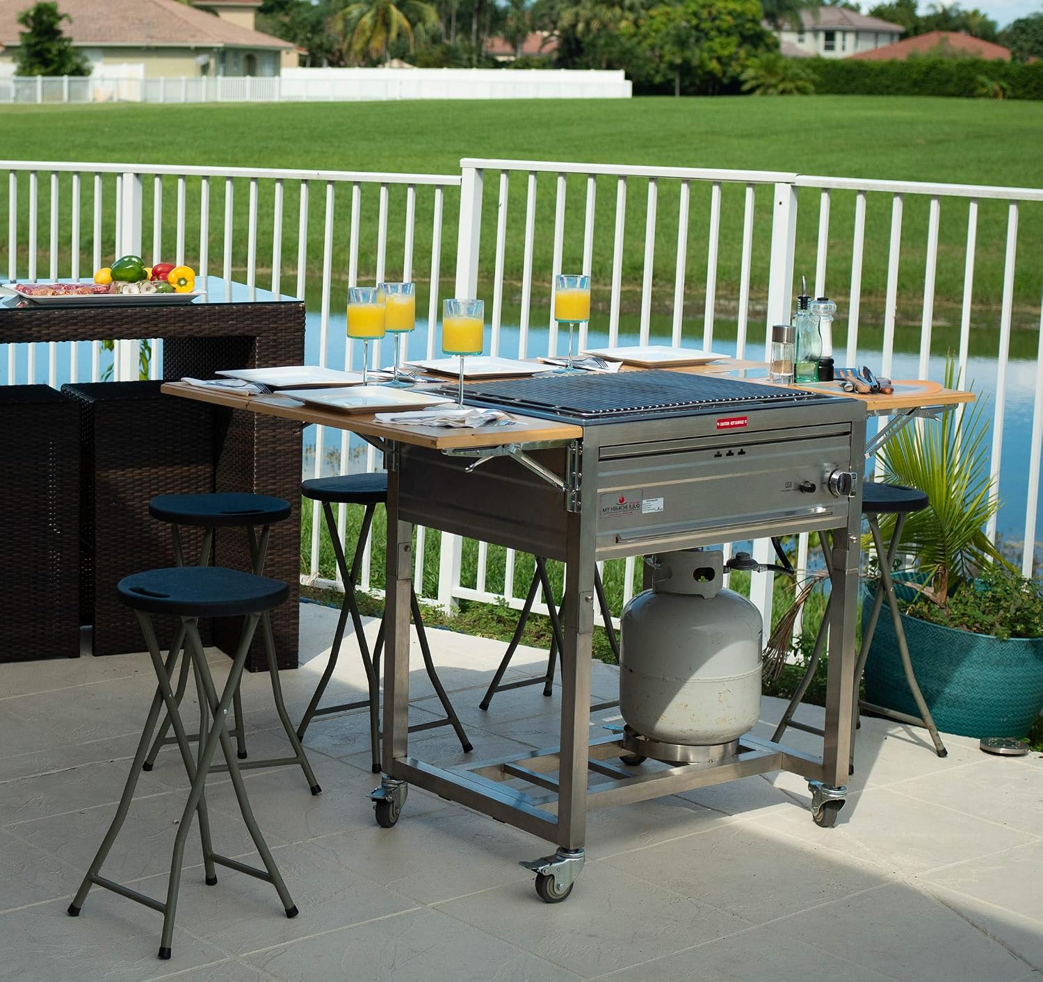 3-in-1 Sit Around Grill with Flat Top Teppanyaki Griddle, BBQ Rack and Cast Iron Grill - Propane Gas and Stainless Steel - Perfect for Outdoor Cooking and Portable for Tailgating, HBC1B