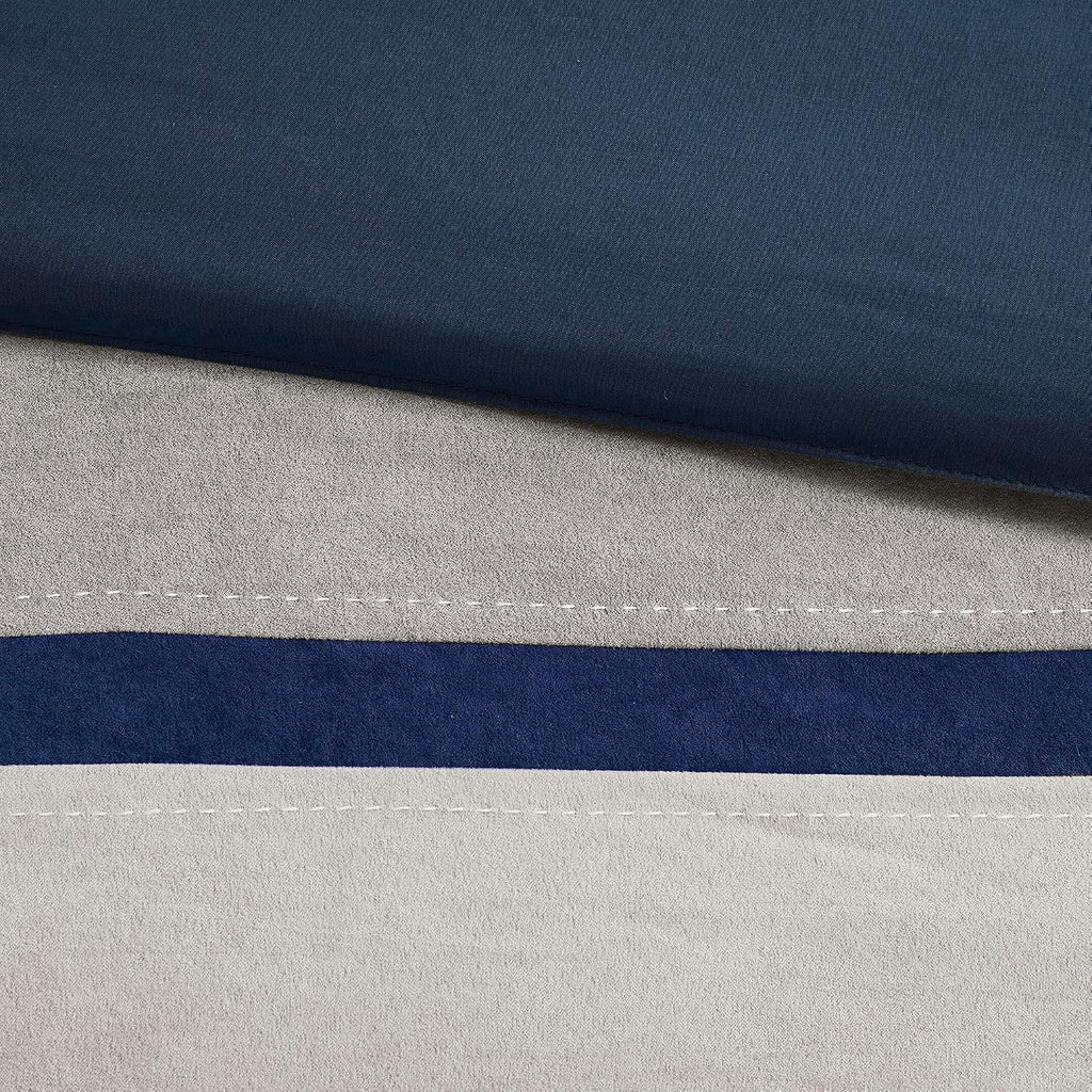 Madison Park Palisades Comforter Set Modern Faux Suede Pieced Stripe Design, All Season Down Alternative Cozy Bedding with Matching Shams, Decorative Pillows, Cal King(104'x92'), Blue 7 Piece